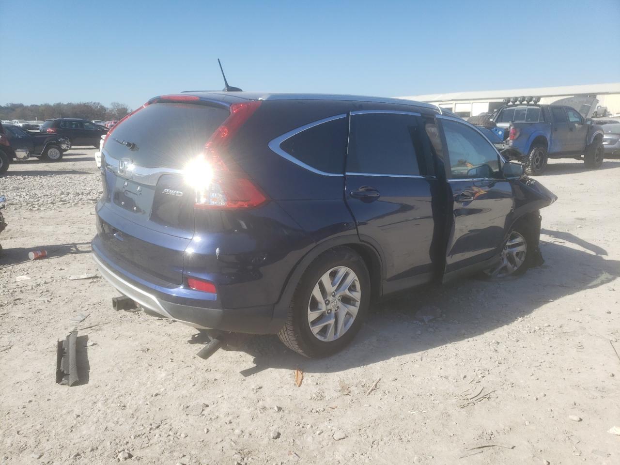 Photo 4 from auction – 2016 HONDA CR-V EXL with VIN 2HKRM4H70GH632661