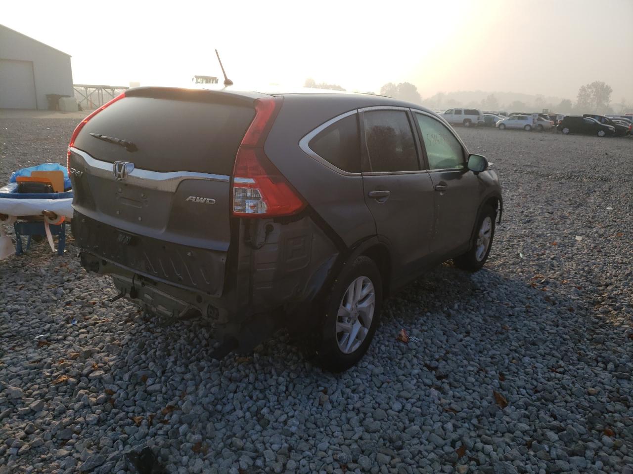 Photo 4 from auction – 2015 HONDA CR-V EX with VIN 2HKRM4H50FH670159
