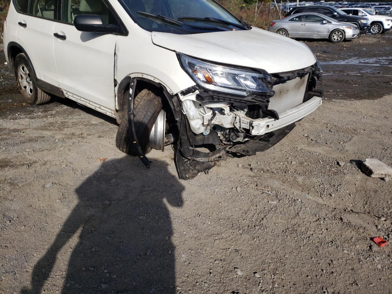 Photo 9 from auction – 2016 HONDA CR-V LX with VIN 5J6RM4H32GL099327