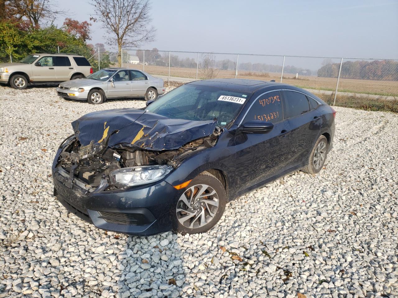 Photo 2 from auction – 2017 HONDA CIVIC EX with VIN 19XFC2F79HE001538