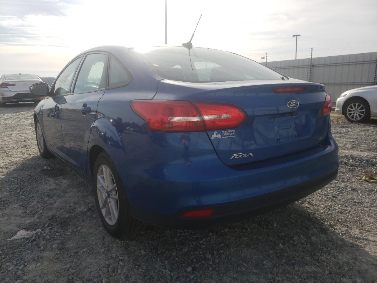 Photo 3 from auction – 2018 FORD FOCUS SE with VIN 1FADP3F23JL216180