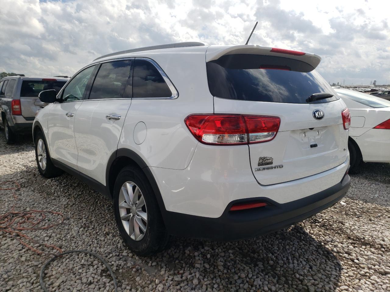 Photo 3 from auction – 2017 KIA SORENTO LX with VIN 5XYPG4A52HG323323