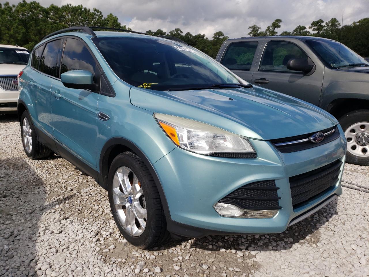 FORD ESCAPE SE 2013 with VIN 1FMCU0GX8DUC34353 - Photo from auction