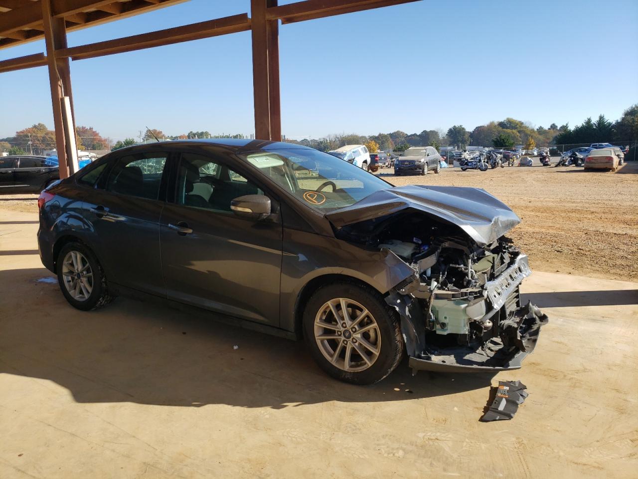 FORD FOCUS SE 2016 with VIN 1FADP3F22GL370145 - Photo from auction