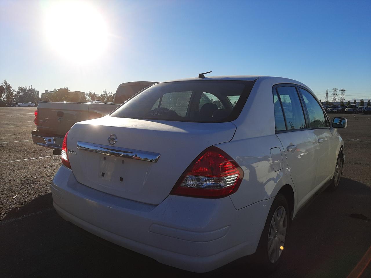 Photo 4 from auction – 2011 NISSAN VERSA S with VIN 3N1BC1AP7BL463408