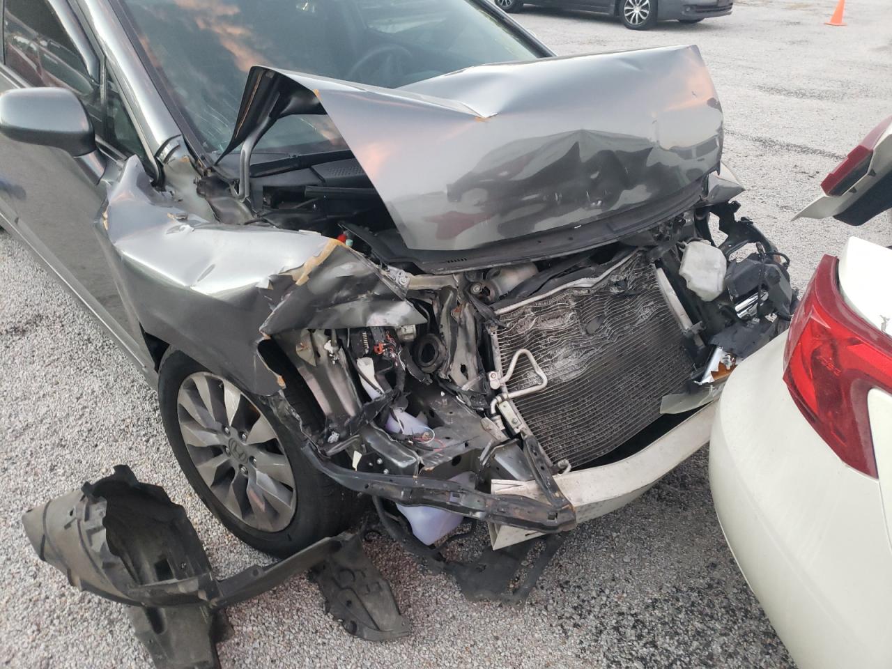 Photo 9 from auction – 2010 HONDA CIVIC EX with VIN 19XFA1F80AE039142
