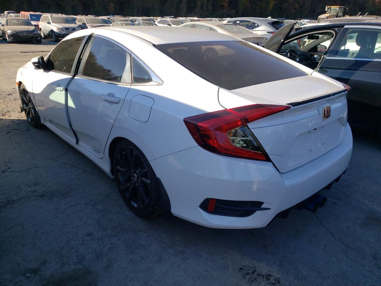 Photo 3 from auction – 2019 HONDA CIVIC SPOR with VIN 2HGFC2E80KH511154