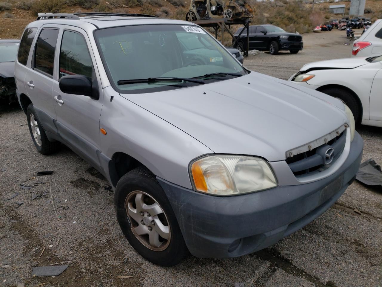 MAZDA TRIBUTE DX 2001 with VIN 4F2YU06B91KM67326 - Photo from auction