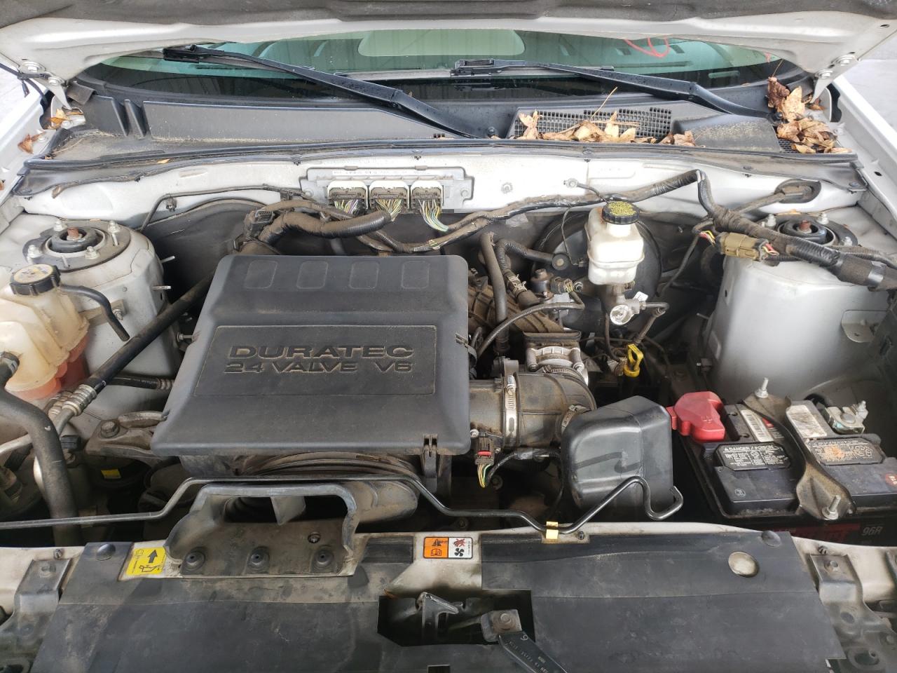 Photo 7 from auction – 2011 MERCURY MARINER PR with VIN 4M2CN8HG4BKJ08458