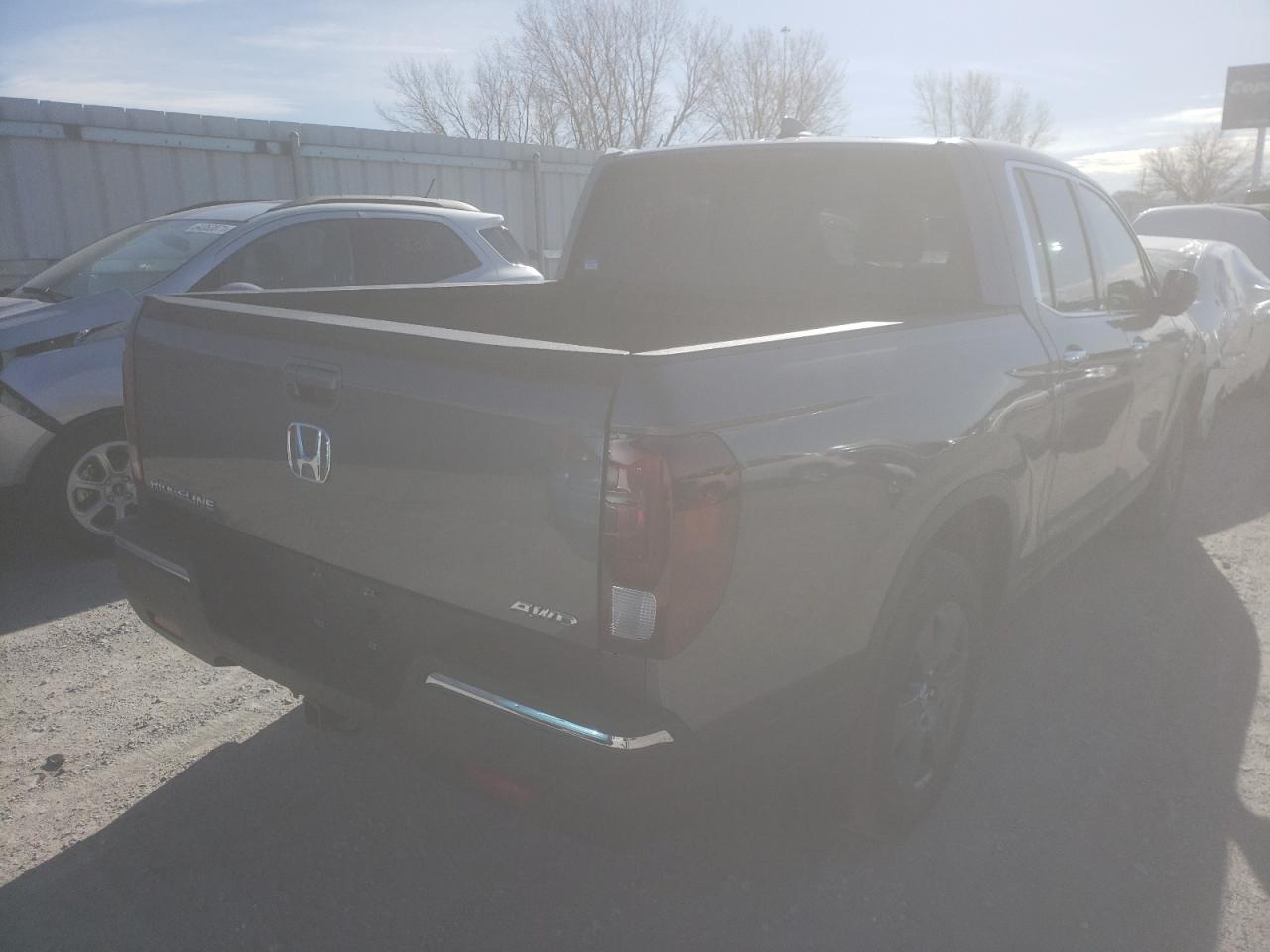Photo 4 from auction – 2020 HONDA RIDGELINE with VIN 5FPYK3F78LB012848