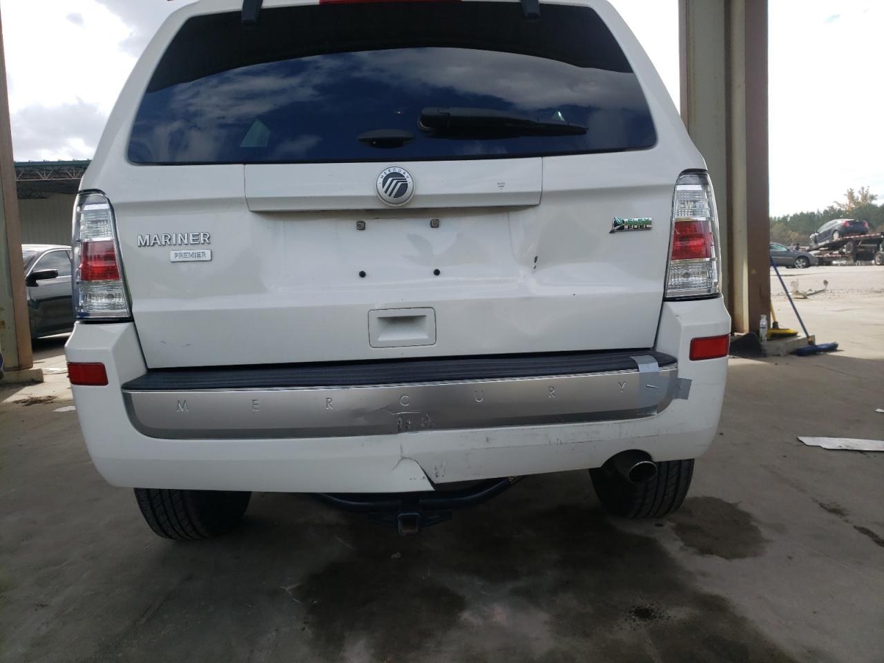 Photo 9 from auction – 2011 MERCURY MARINER PR with VIN 4M2CN8HG4BKJ08458