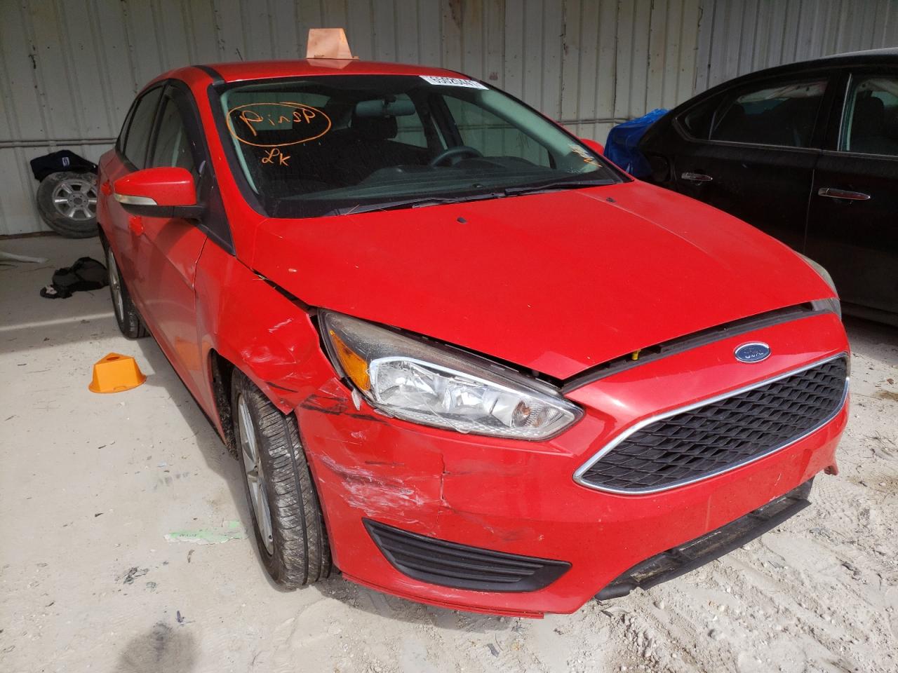 FORD FOCUS SE 2015 with VIN 1FADP3F28FL259498 - Photo from auction