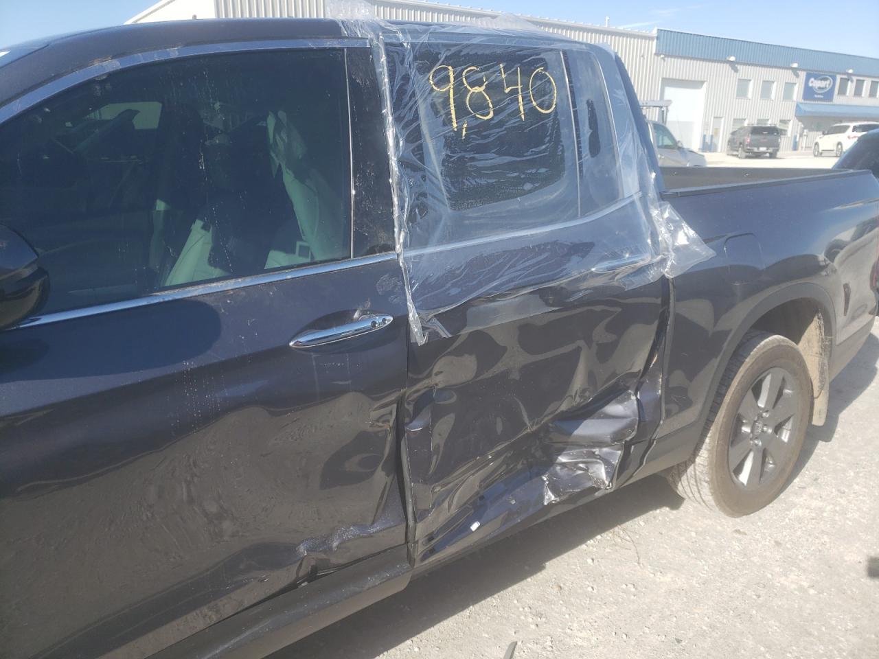 Photo 9 from auction – 2020 HONDA RIDGELINE with VIN 5FPYK3F78LB012848