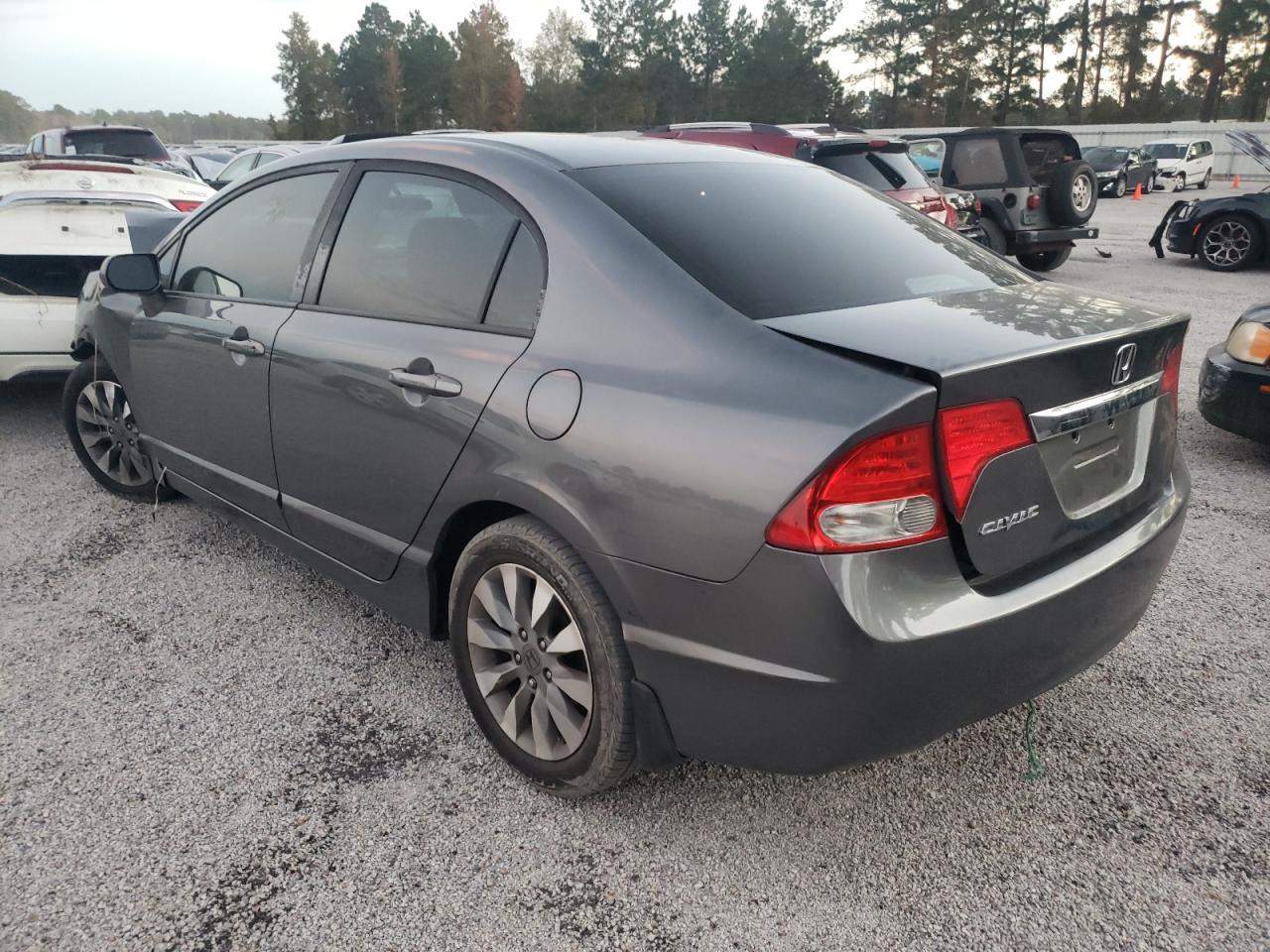 Photo 3 from auction – 2010 HONDA CIVIC EX with VIN 19XFA1F80AE039142