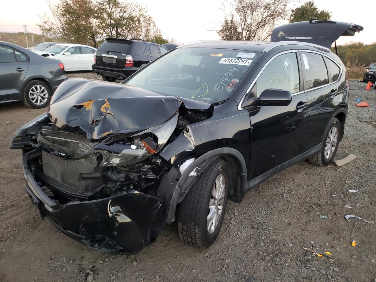 Photo 2 from auction – 2014 HONDA CR-V EXL with VIN 2HKRM3H74EH514443