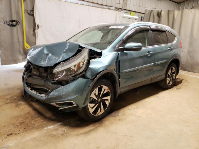 Photo 2 from auction – 2015 HONDA CR-V TOURI with VIN 5J6RM3H94FL005672