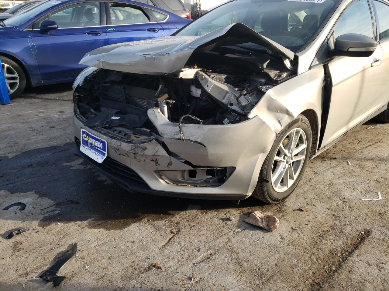 Photo 9 from auction – 2015 FORD FOCUS SE with VIN 1FADP3F20FL209453