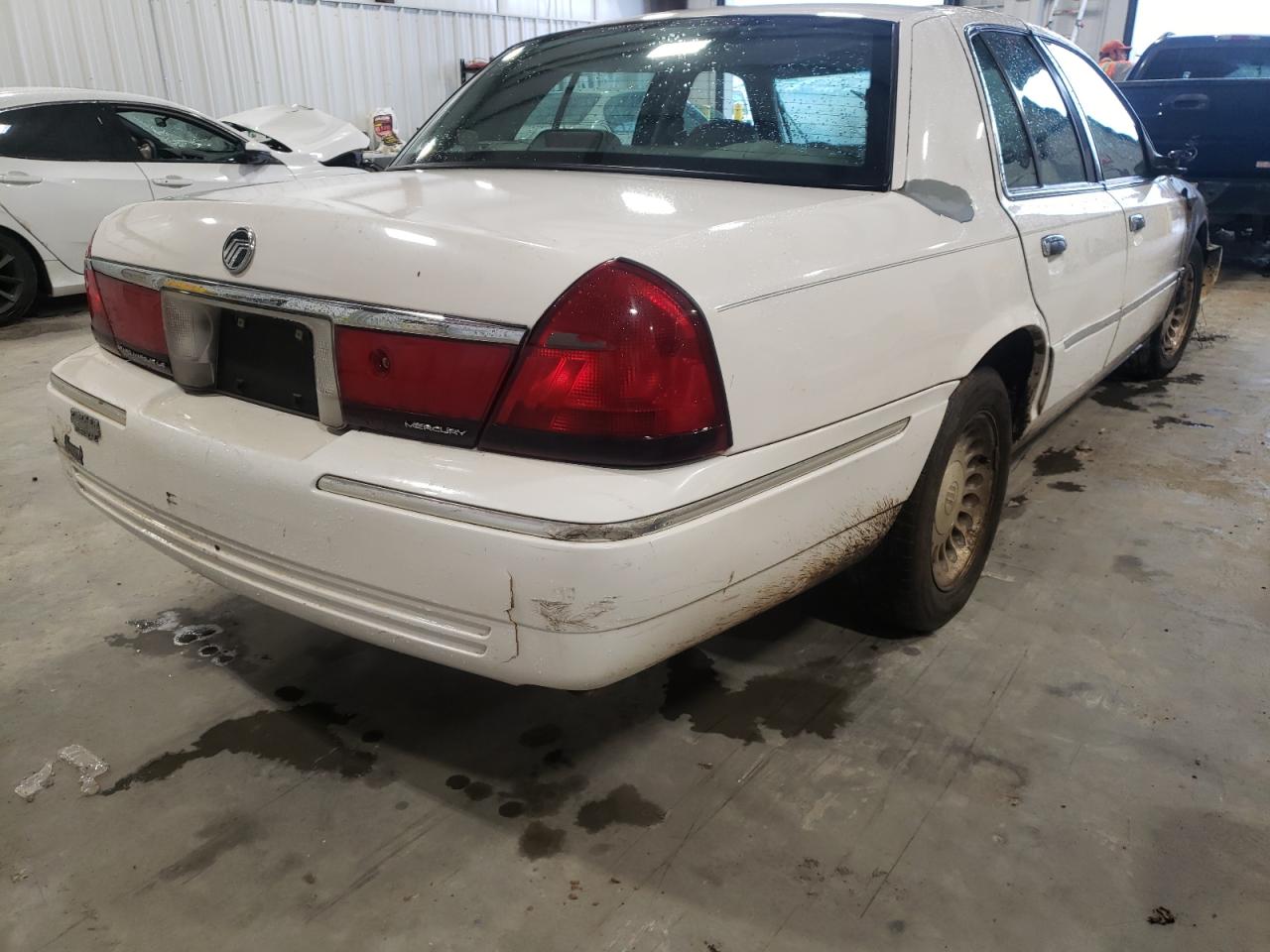 Photo 4 from auction – 2002 MERCURY GRAND MARQ with VIN 2MEFM75W12X633940