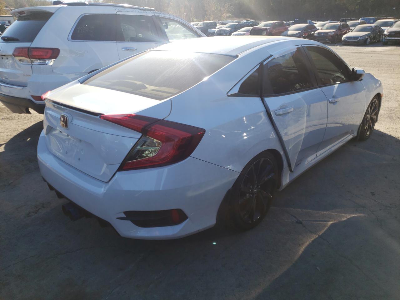 Photo 4 from auction – 2019 HONDA CIVIC SPOR with VIN 2HGFC2E80KH511154