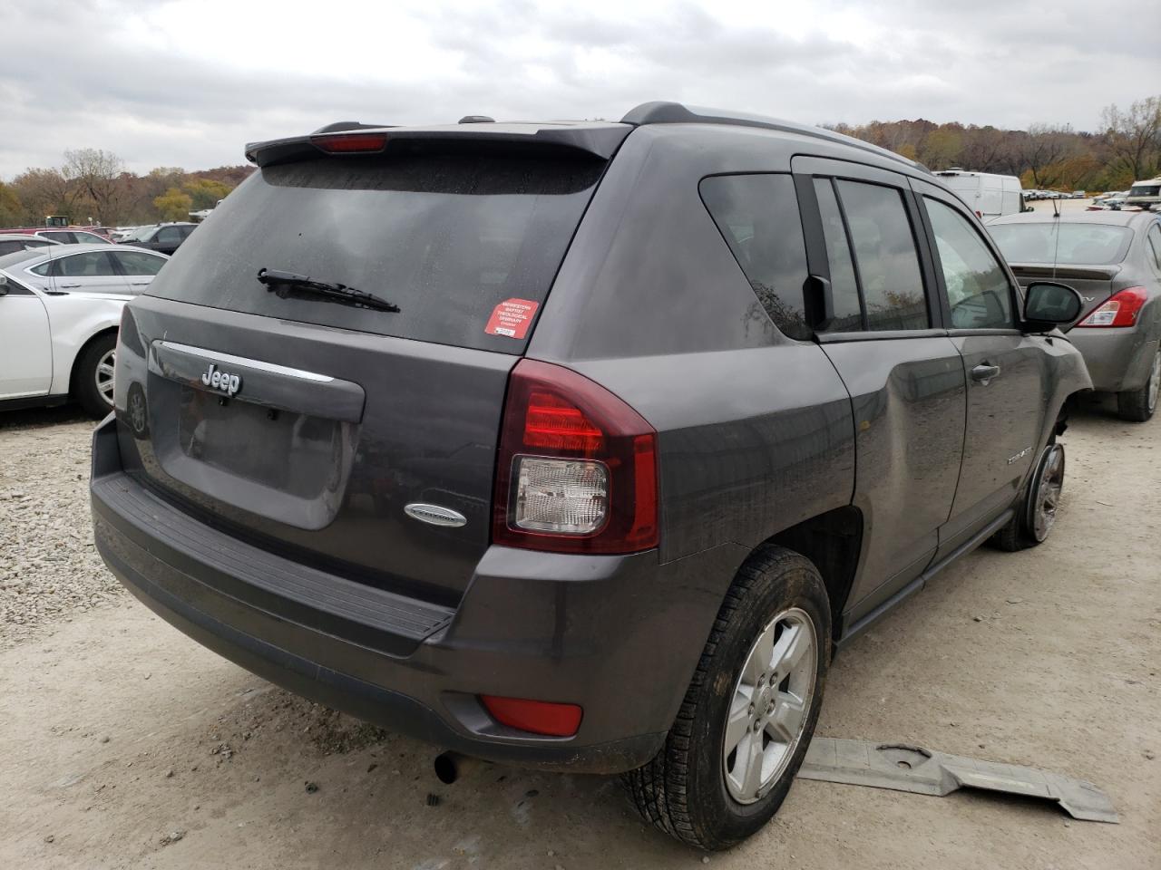 Photo 4 from auction – 2016 JEEP COMPASS LA with VIN 1C4NJCEAXGD710077