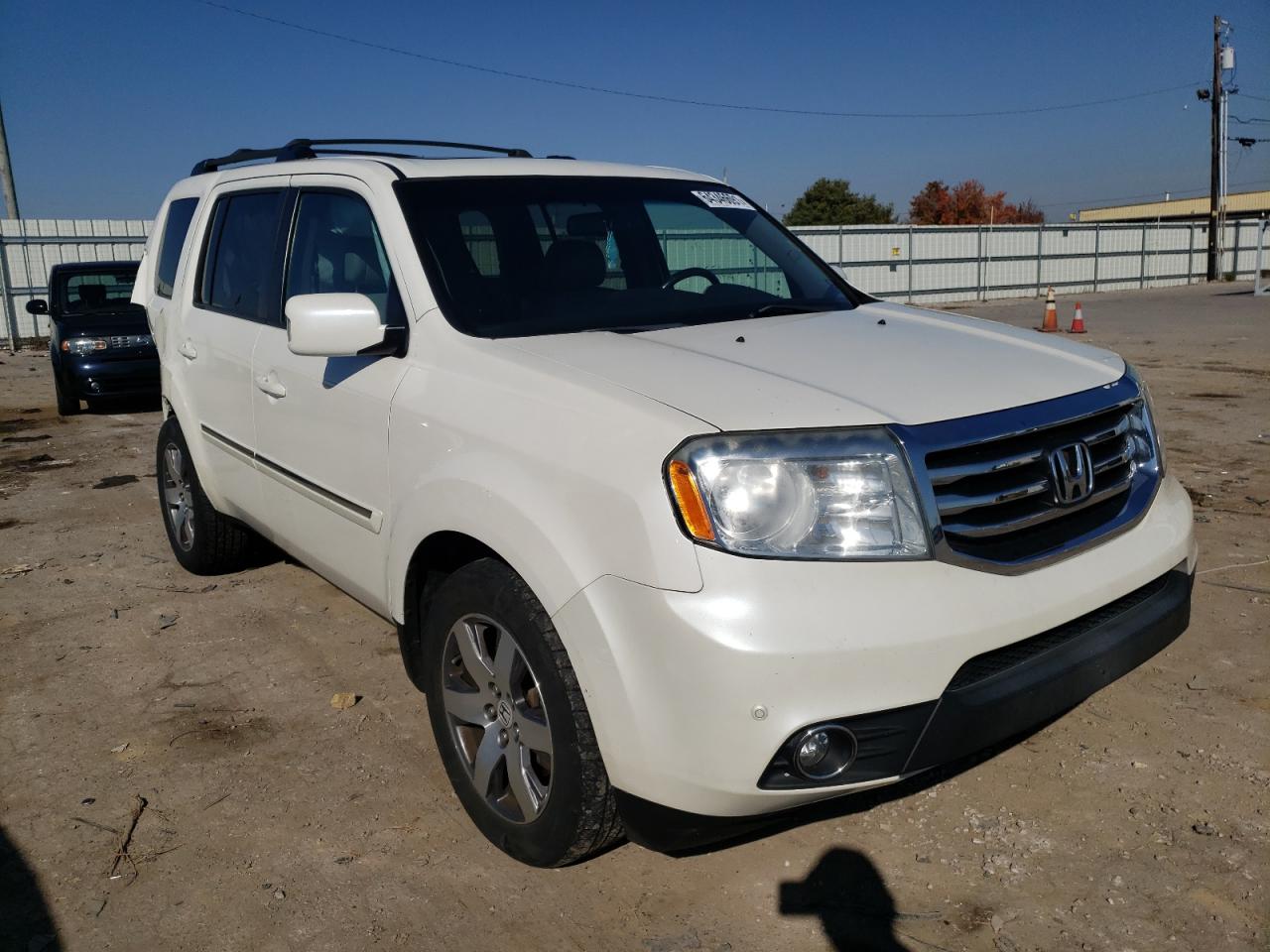 HONDA PILOT TOUR 2013 with VIN 5FNYF4H95DB084822 - Photo from auction