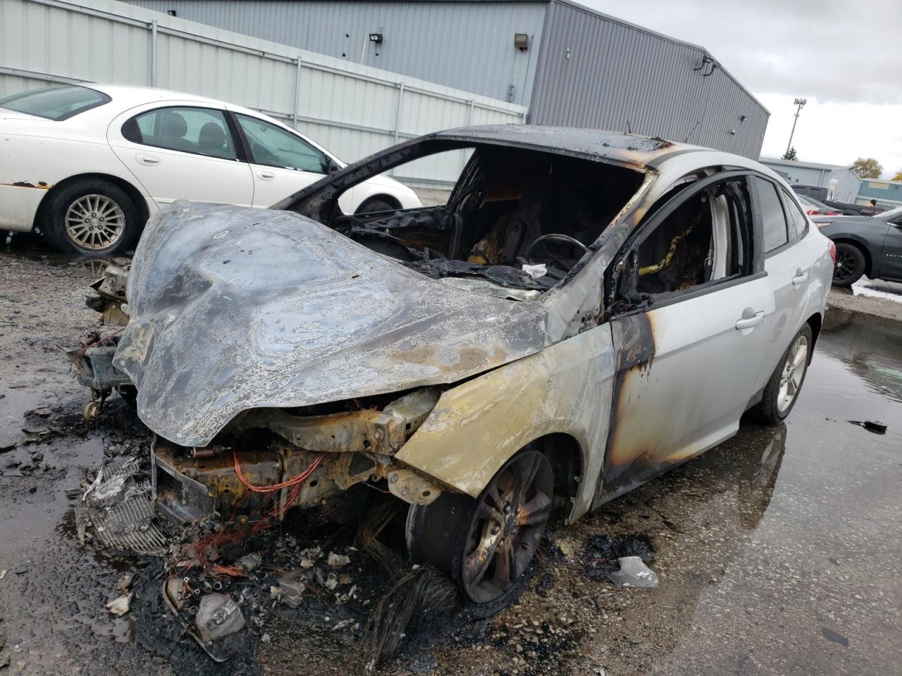 Photo 2 from auction – 2013 FORD FOCUS SE with VIN 1FADP3F26DL371942