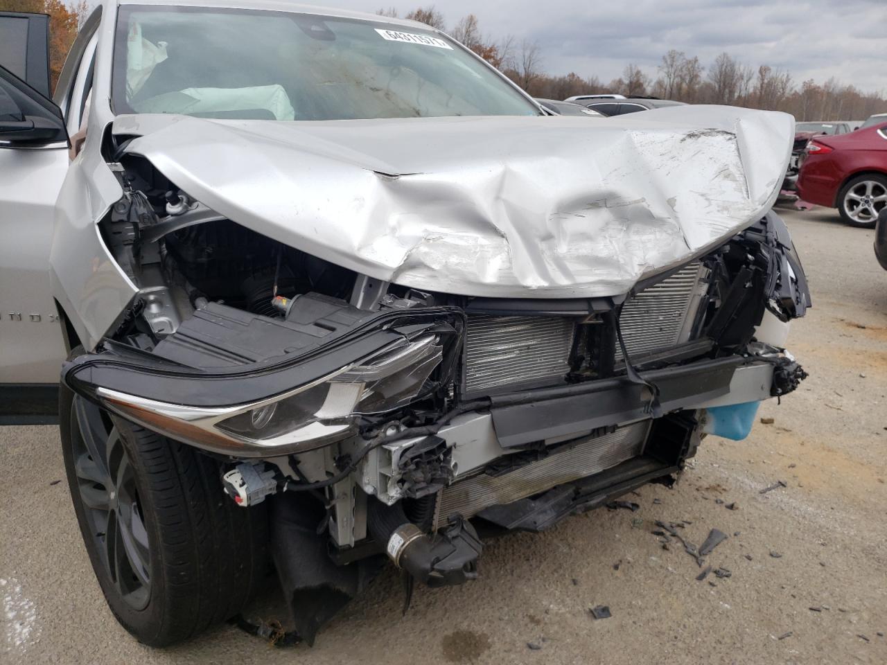 Photo 7 from auction – 2020 CHEVROLET EQUINOX LT with VIN 3GNAXUEV9LS721482
