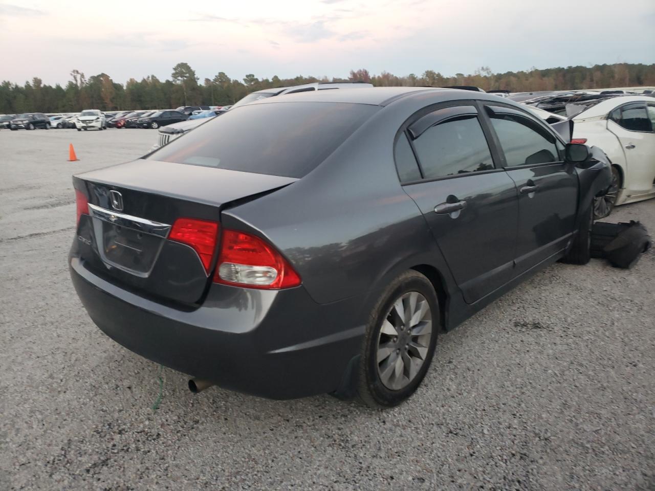 Photo 4 from auction – 2010 HONDA CIVIC EX with VIN 19XFA1F80AE039142