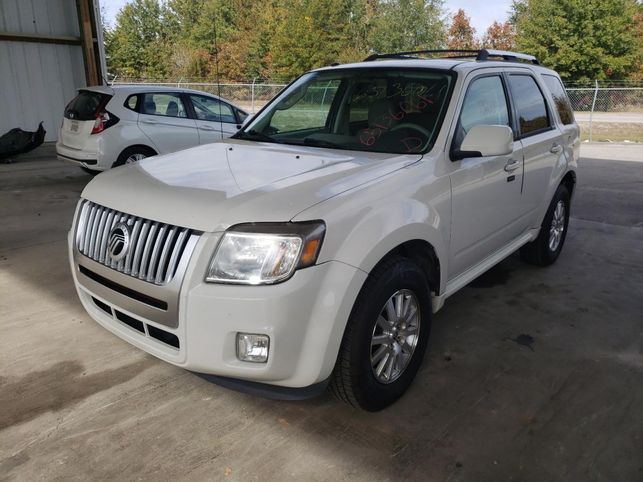 Photo 2 from auction – 2011 MERCURY MARINER PR with VIN 4M2CN8HG4BKJ08458
