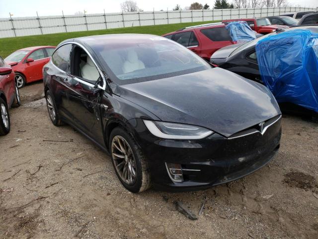 TESLA MODEL X 2017 with VIN 5YJXCBE47HF035659 - Photo from auction