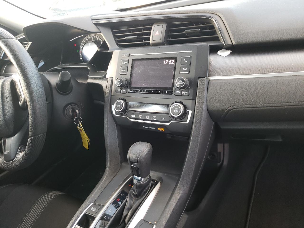Photo 9 from auction – 2018 HONDA CIVIC LX with VIN 19XFC2F57JE024028