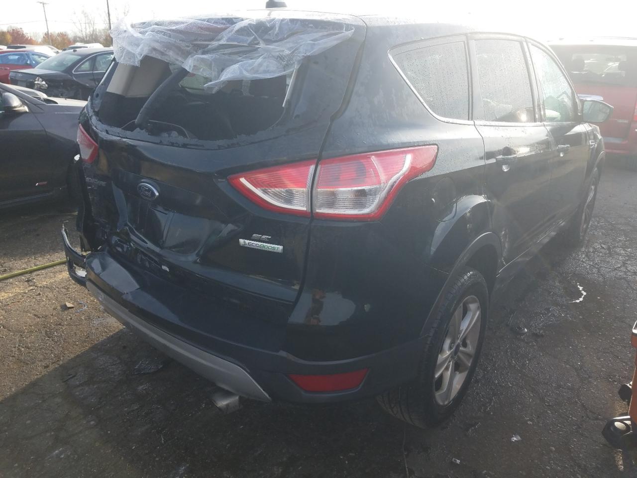 Photo 4 from auction – 2014 FORD ESCAPE SE with VIN 1FMCU0GX3EUC29059