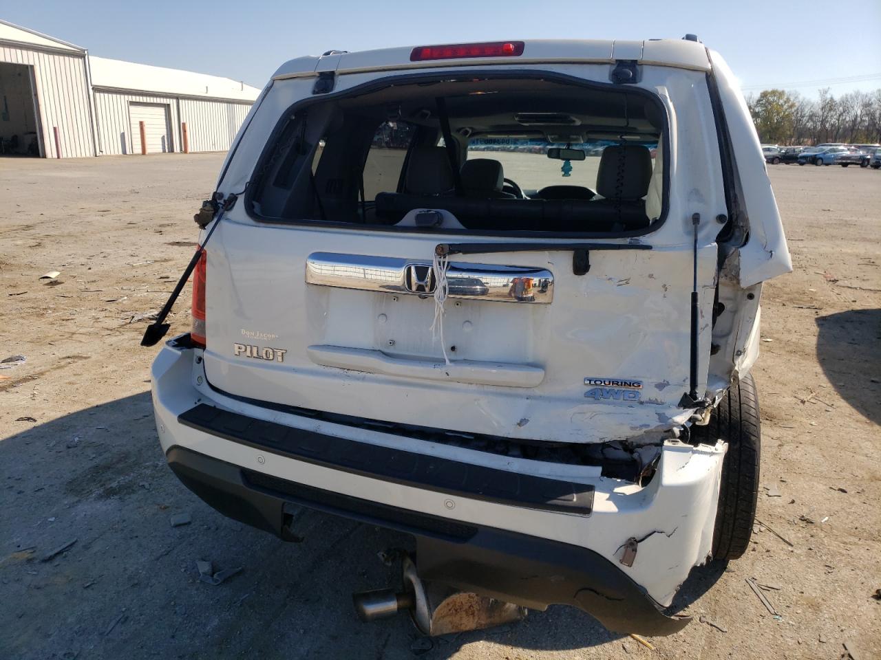 Photo 9 from auction – 2013 HONDA PILOT TOUR with VIN 5FNYF4H95DB084822