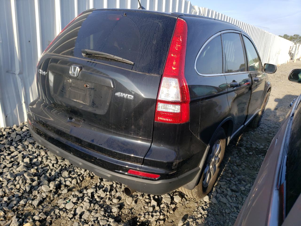 Photo 4 from auction – 2011 HONDA CR-V SE with VIN 5J6RE4H40BL100134