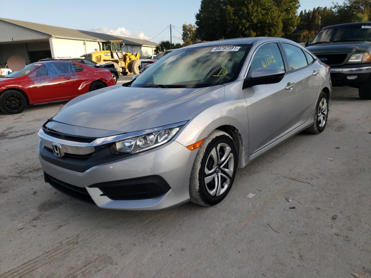 Photo 2 from auction – 2018 HONDA CIVIC LX with VIN 19XFC2F57JE024028