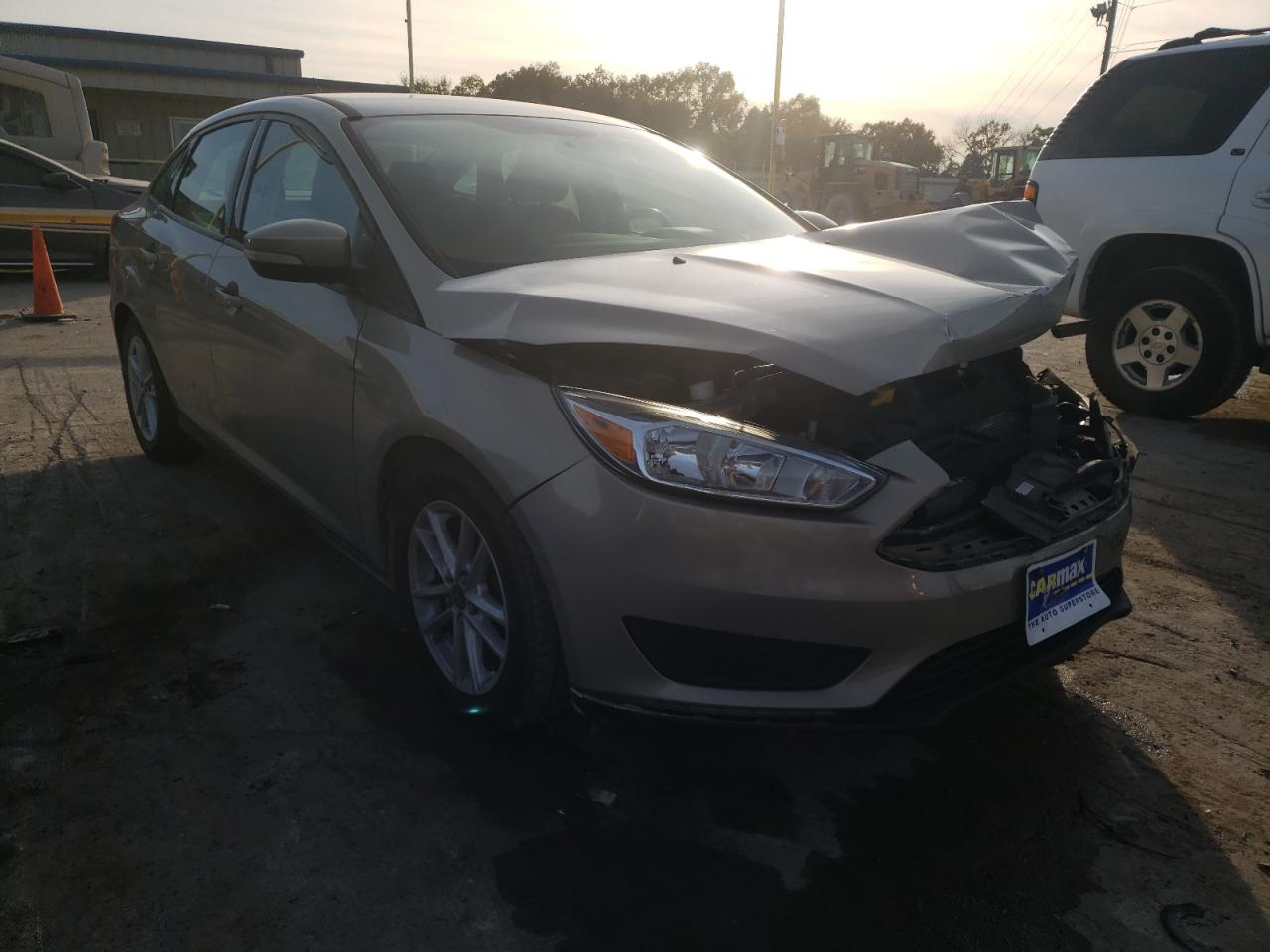 FORD FOCUS SE 2015 with VIN 1FADP3F20FL209453 - Photo from auction
