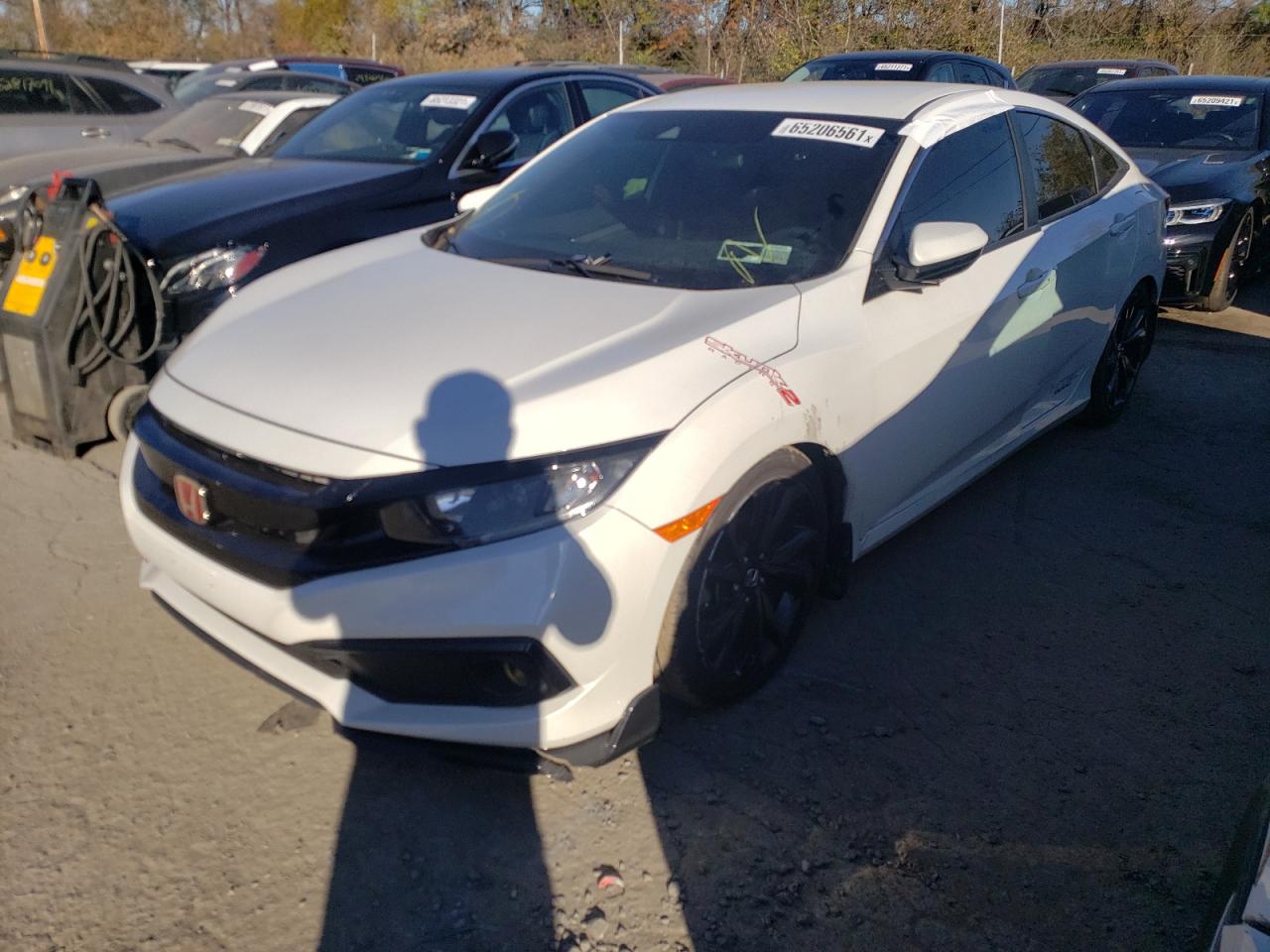 Photo 2 from auction – 2019 HONDA CIVIC SPOR with VIN 2HGFC2E80KH511154