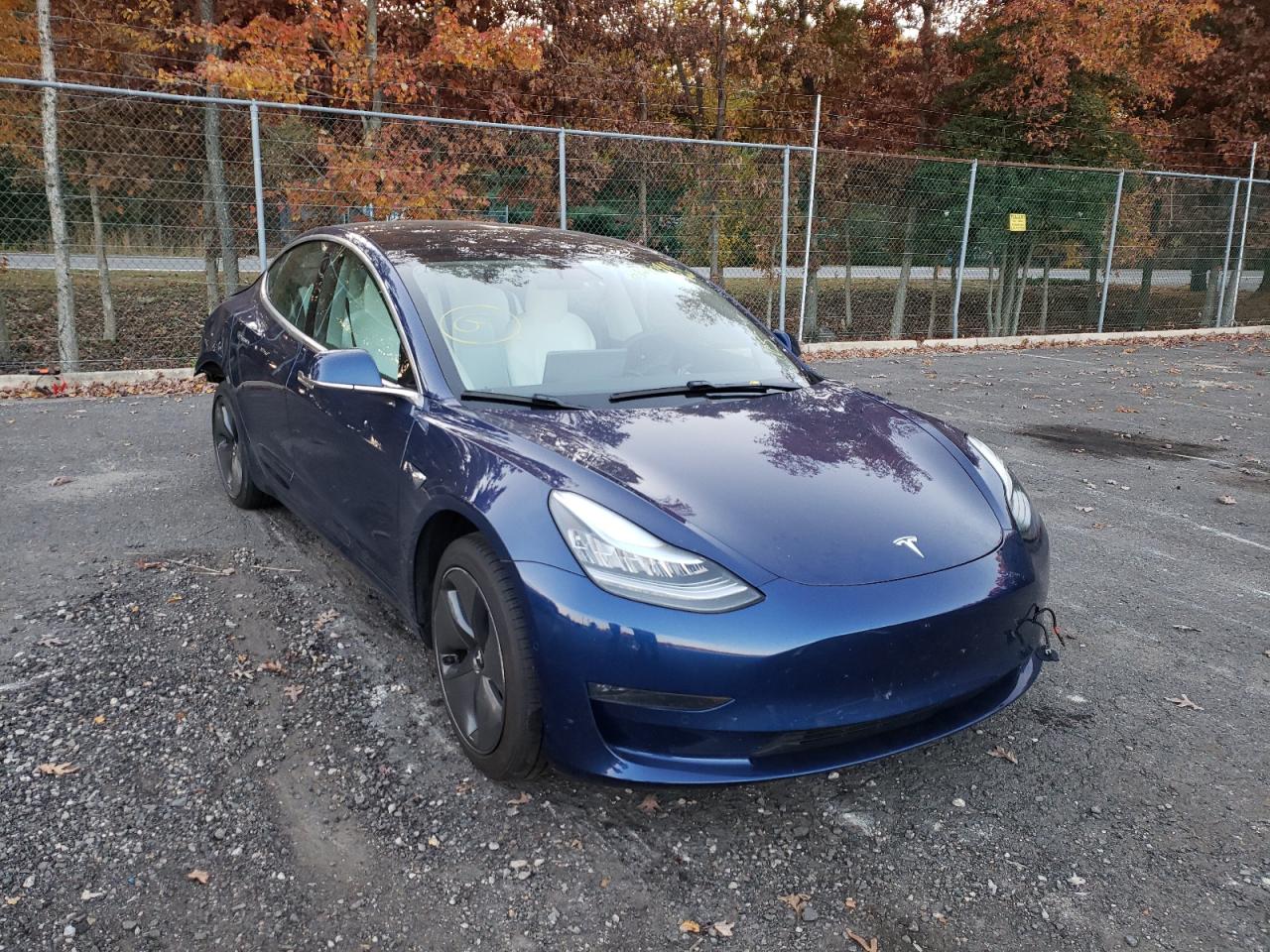 TESLA MODEL 3 2019 with VIN 5YJ3E1EB3KF477508 - Photo from auction