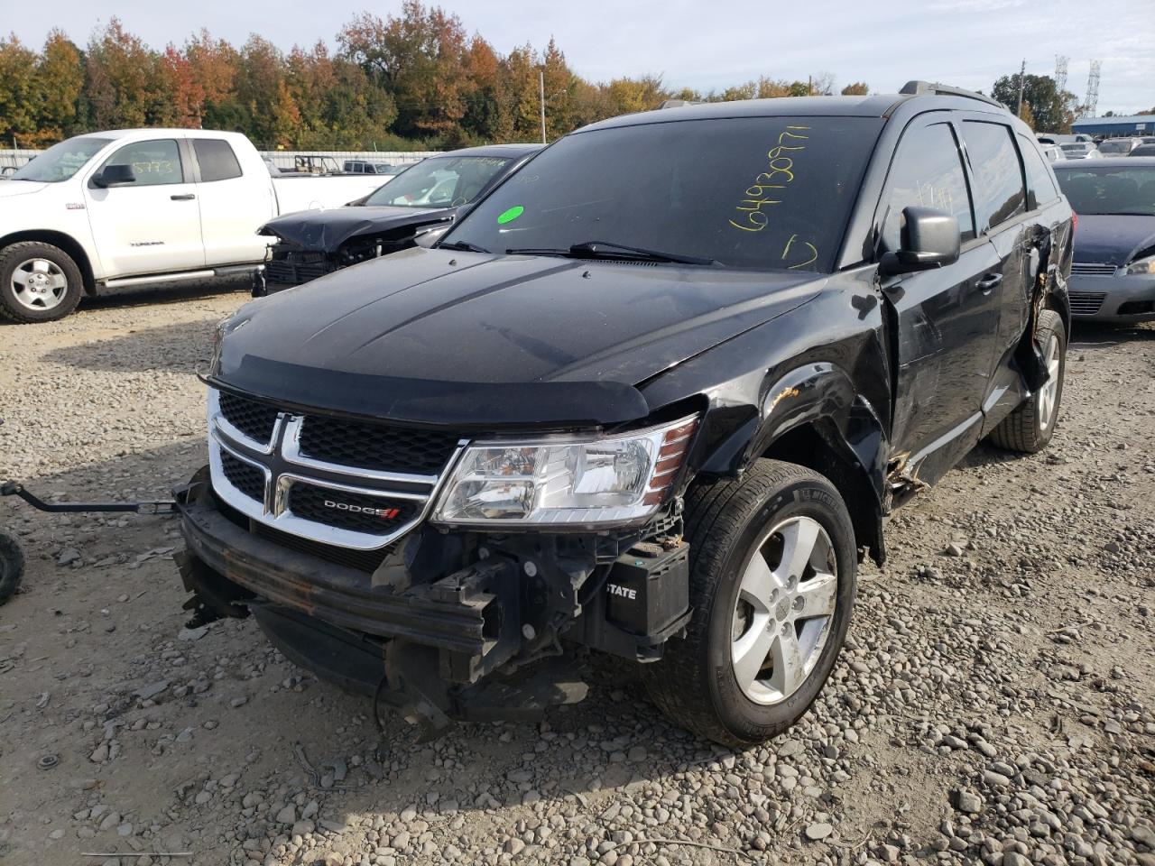 Photo 2 from auction – 2014 DODGE JOURNEY SE with VIN 3C4PDCAB7ET198235