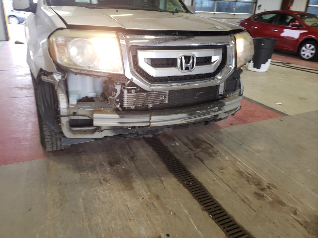 Photo 9 from auction – 2010 HONDA PILOT EX with VIN 5FNYF4H46AB009692