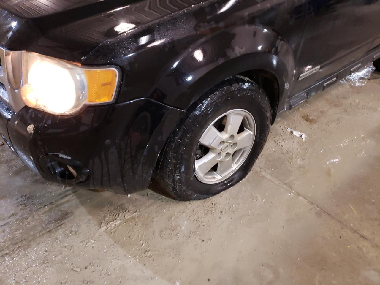 Photo 9 from auction – 2008 FORD ESCAPE XLT with VIN 1FMCU93Z18KA55133