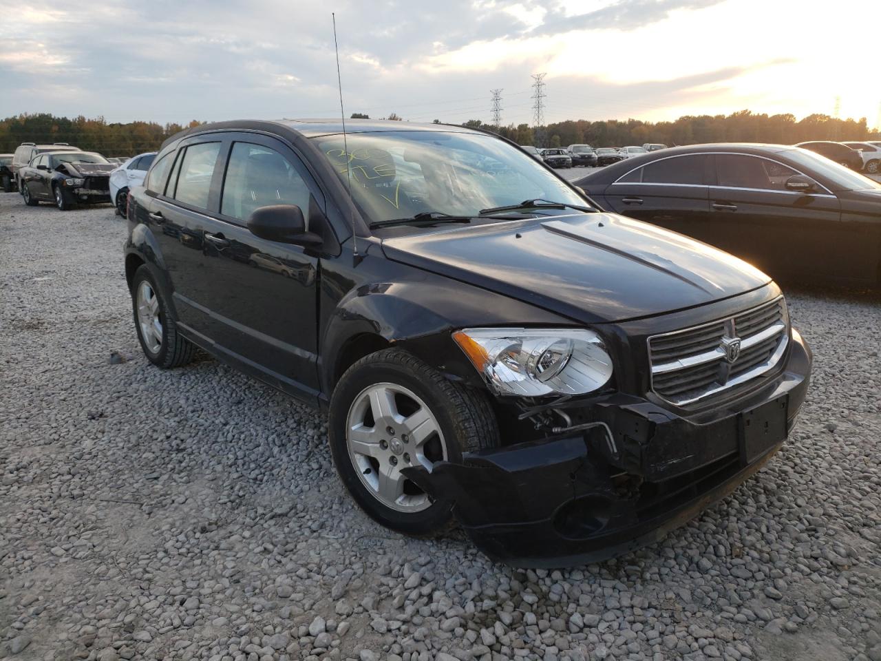 DODGE CALIBER MA 2011 with VIN 1B3CB3HAXBD132914 - Photo from auction