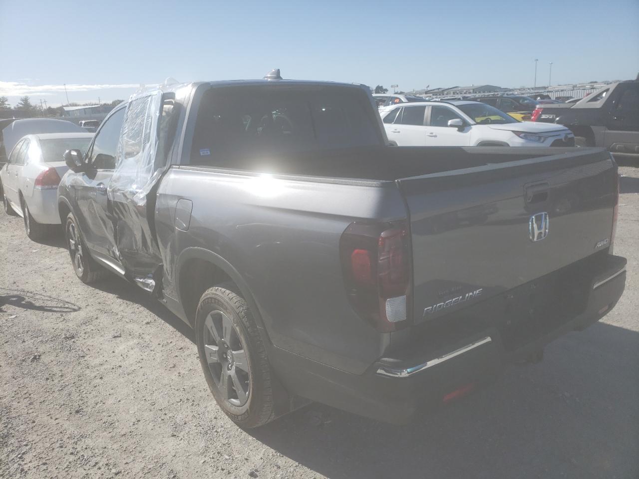 Photo 3 from auction – 2020 HONDA RIDGELINE with VIN 5FPYK3F78LB012848