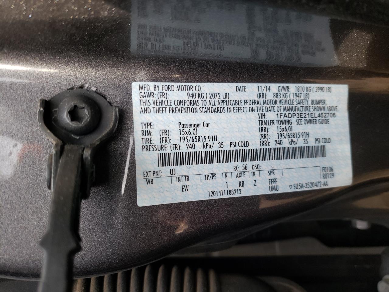 Photo 10 from auction – 2014 FORD FOCUS TITA with VIN 1FADP3E21EL452706