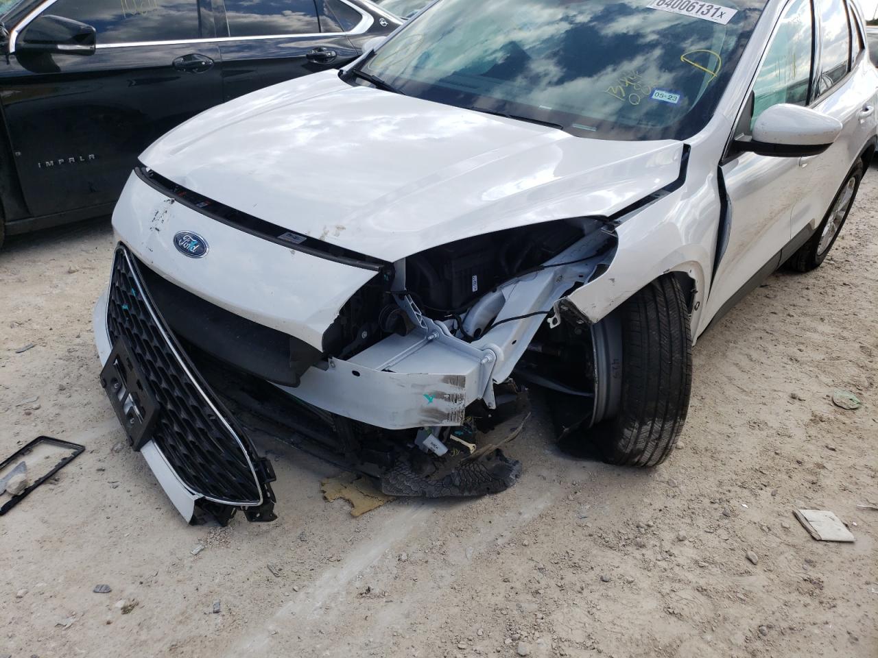 Photo 9 from auction – 2020 FORD ESCAPE SE with VIN 1FMCU0G65LUB44082