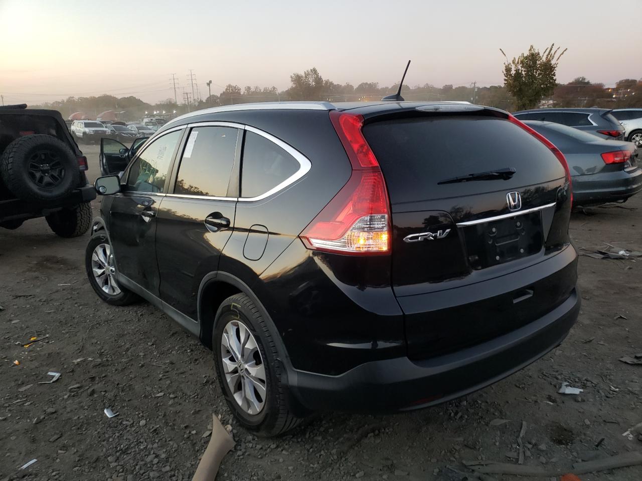 Photo 3 from auction – 2014 HONDA CR-V EXL with VIN 2HKRM3H74EH514443