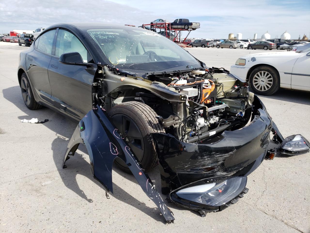 TESLA MODEL 3 2021 with VIN 5YJ3E1EA2MF973121 - Photo from auction