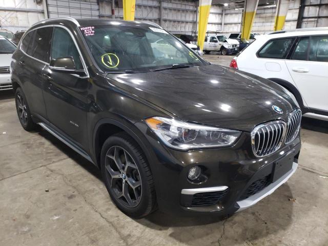 BMW X1 XDRIVE2 2017 with VIN WBXHT3C31H5F81711 - Photo from auction