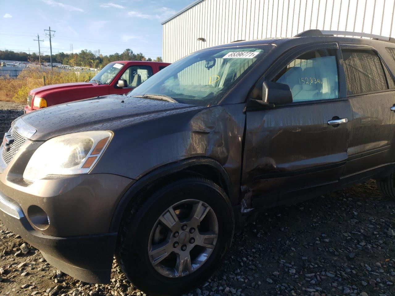 Photo 9 from auction – 2011 GMC ACADIA SLE with VIN 1GKKRNED0BJ228704
