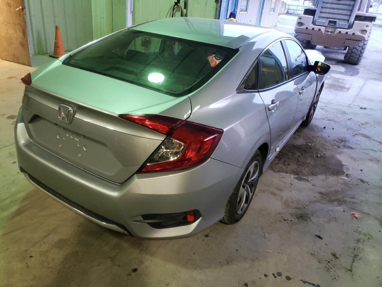 Photo 4 from auction – 2019 HONDA CIVIC LX with VIN 2HGFC2F6XKH500692